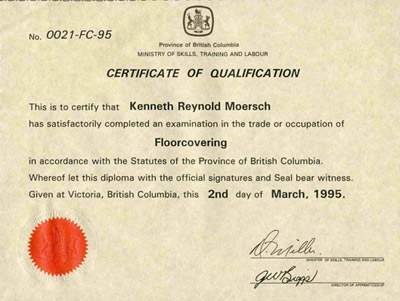 Official Certificate of Qualification for Kenneth Reynold Moore in the trade of Floorcovering, issued by the Ministry of Skills, Training and Labour of British Columbia, dated March 2nd, 1995